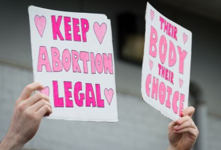 protest signs reads 'Keep Abortion Legal' in hearts