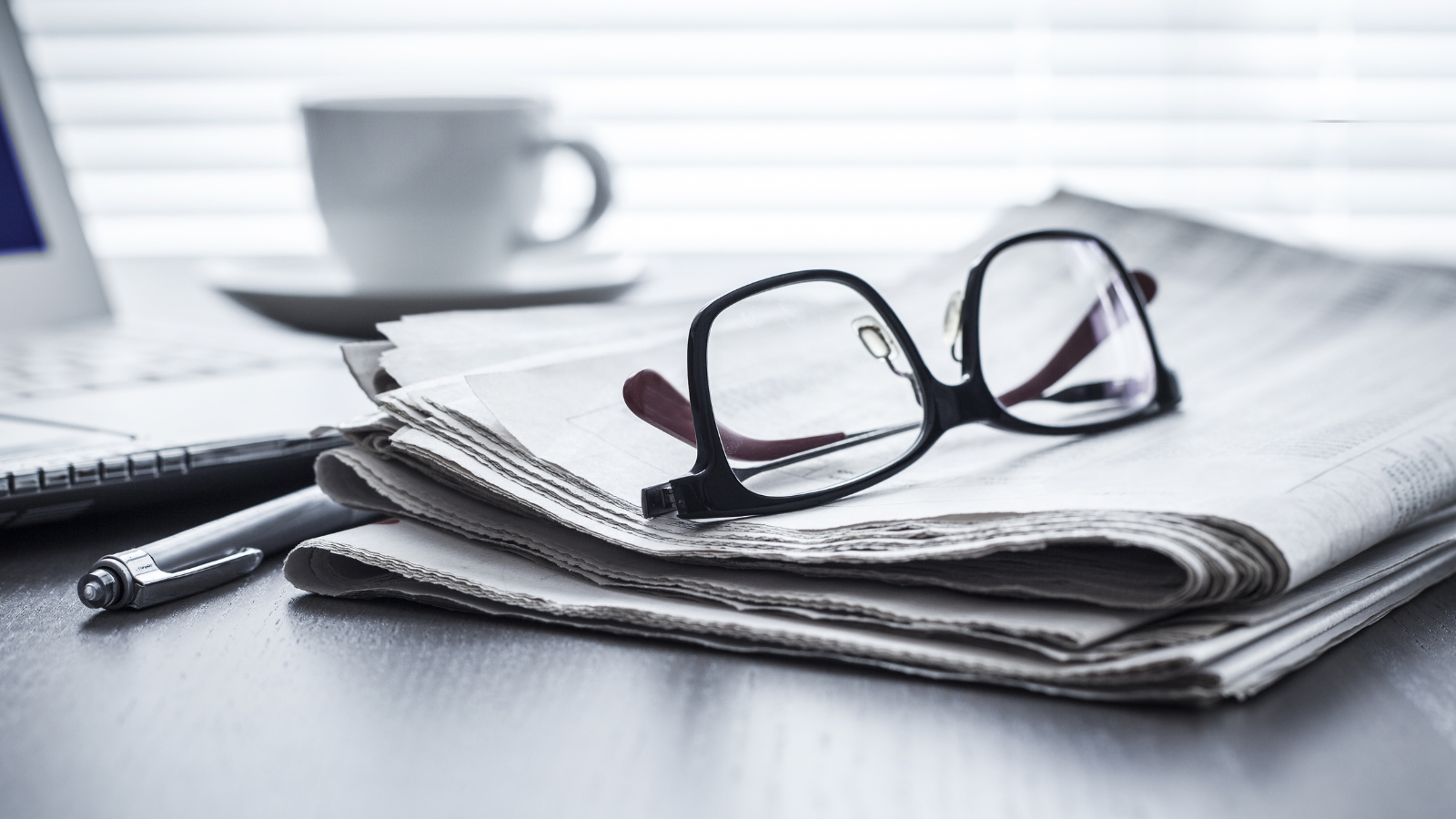 newspaper-and-glasses