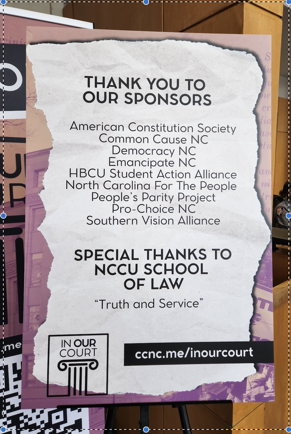 A sign thanking the many sponsors of the "In Our Courts" event taking place at NCCU. 